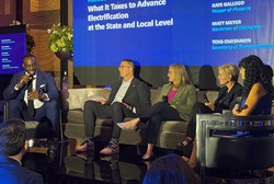 CalSTA Secretary Omishakin on a panel at the Electric Innovation Awards.